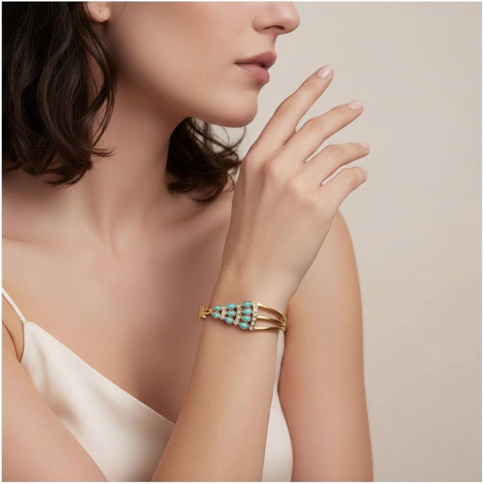 Gold Tone Stainless Steel Blue Crystal Bangle