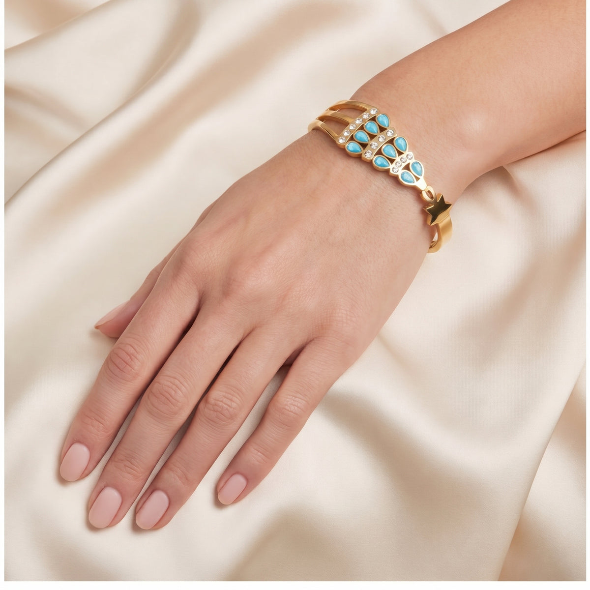 Gold Tone Stainless Steel Blue Crystal Bangle